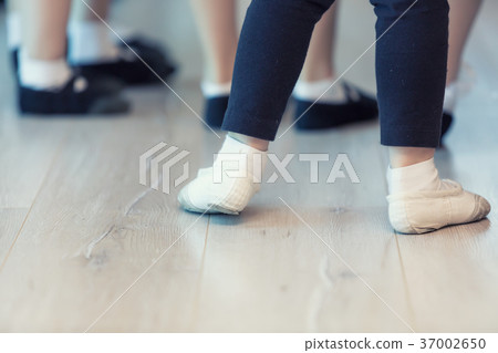 Close Up Of Children's Ballet Feet 37002650