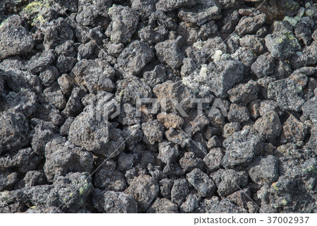 Frozen volcanic lava closeup thousands of years 37002937