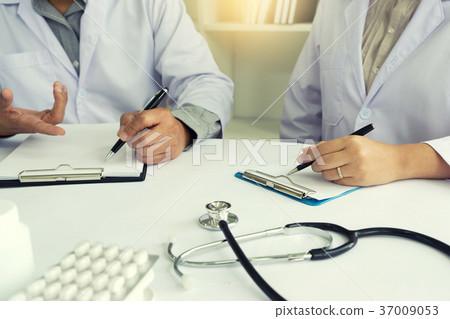 Two doctor talking and consult about healtcare 37009053