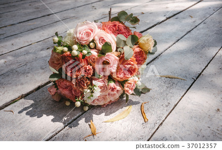wedding bouquet on the wooden floor wedding bouquet on the wooden floor 37012357