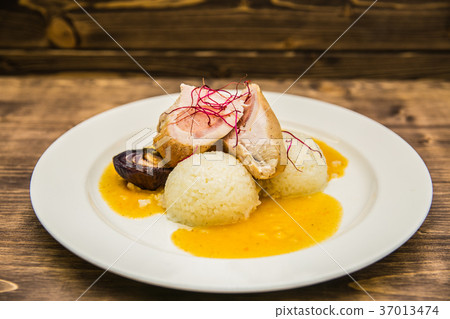 Food on a plate, on a wooden background 37013474