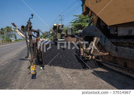 An asphalt machine An asphalt machine 37014967