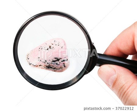 view of rhodochrosite gem stone through magnifier view of rhodochrosite gem stone through magnifier 37022912