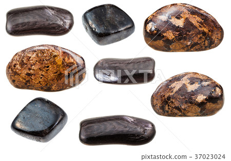 various forms of Enstatite rock isolated on white various forms of Enstatite rock isolated on white 37023024