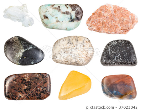 set of various tumbled stones isolated on white 37023042