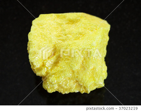 raw native Sulphur stone on dark background raw native Sulphur stone on dark background 37023219
