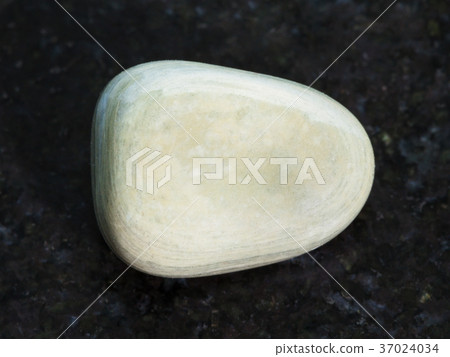 polished gray Agate gemstone on dark polished gray Agate gemstone on dark 37024034