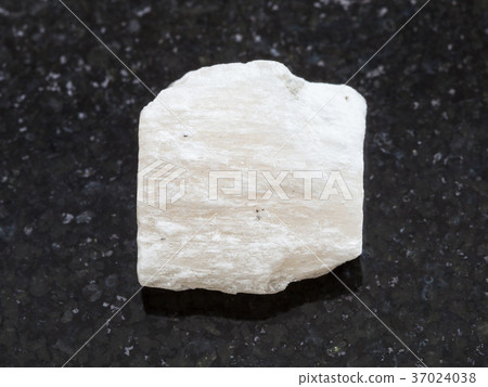 white Gypsum stone on dark background 37024038