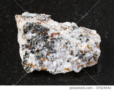 chondrodite and diopside in raw calcite stone chondrodite and diopside in raw calcite stone 37024042