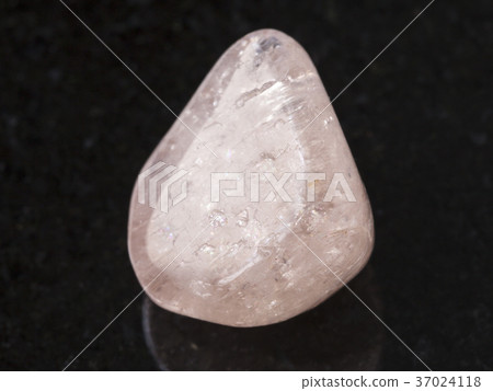 polished morganite (vorobievite) gemstone on dark 37024118