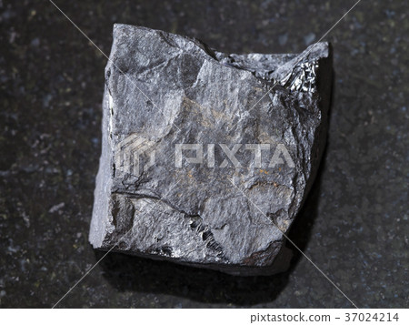 rough carbonaceous shale stone on dark rough carbonaceous shale stone on dark 37024214
