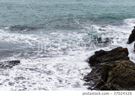 surf and rocks in Atlantic ocean in Iceland surf and rocks in Atlantic ocean in Iceland 37024326