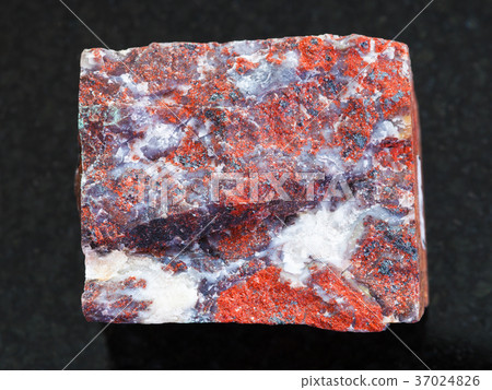 rough Jasper stone on dark background 37024826