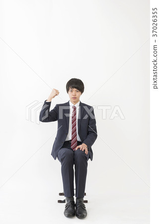 Young businessman doing a guts pose 37026355