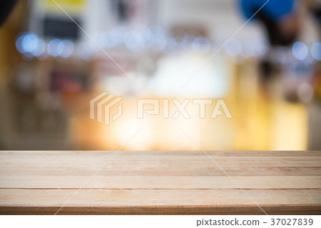 Table wooden desk empty with night bokeh. 37027839