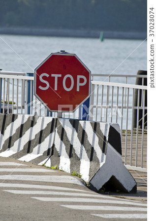 road sign stop in port near sea road sign stop in port near sea 37028074