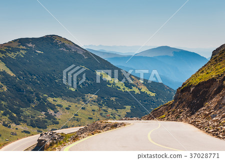 winding and dangerous road in Parang Mountains 37028771