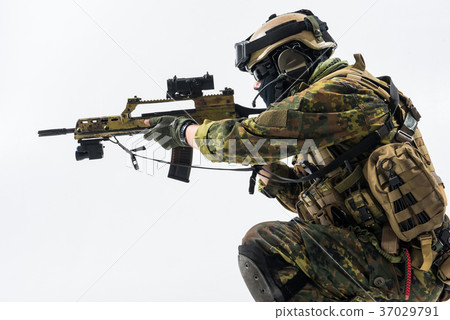 Orderly soldier working with assault carbine Orderly soldier working with assault carbine 37029791