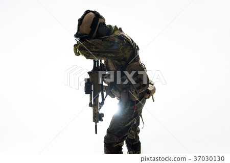 Soldier closing face by hand 37030130