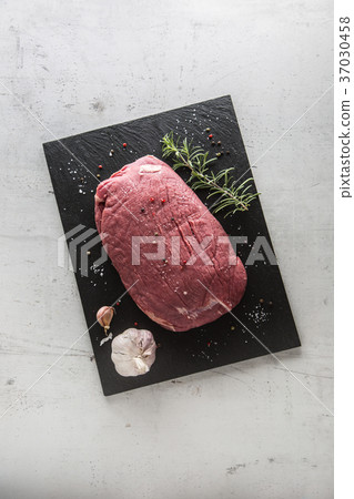 Flank steak with rosemary garlic salt and pepper. Flank steak with rosemary garlic salt and pepper. 37030458