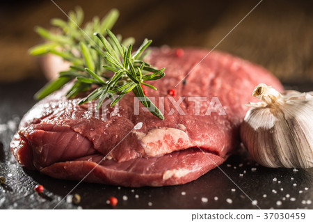 Flank steak with rosemary garlic salt and pepper. Flank steak with rosemary garlic salt and pepper. 37030459