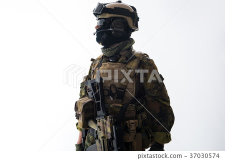 Calm soldier telling by gadget 37030574