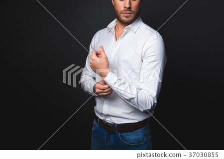 Tranquil male buttoning on cuff 37030855