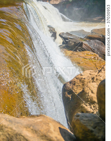 Beautiful waterfall in green forest in jungle 37030953