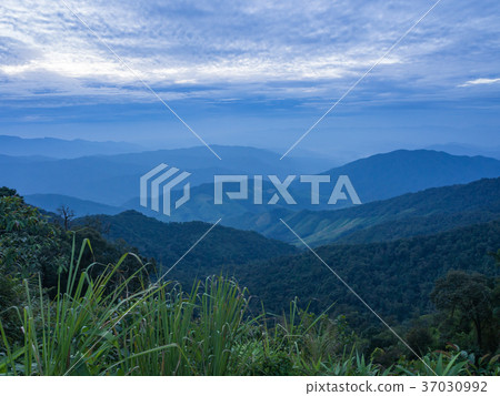 Beautiful cloudy weather in mountains Beautiful cloudy weather in mountains 37030992