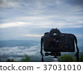Beautiful cloudy weather in mountains 37031010