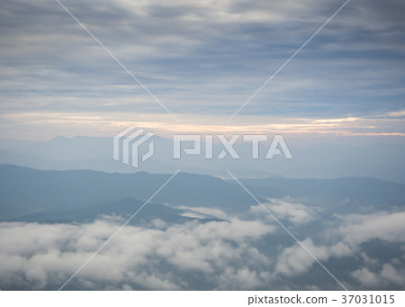 Beautiful cloudy weather in mountains Beautiful cloudy weather in mountains 37031015