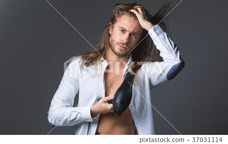 Serious man taking care about himself 37031114