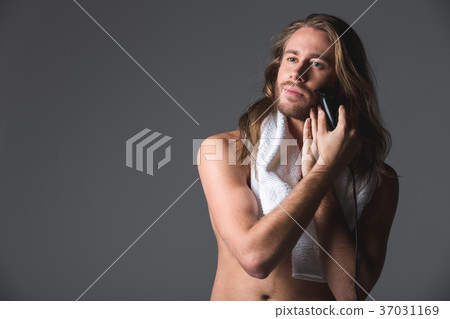 Handsome man arranging his look 37031169