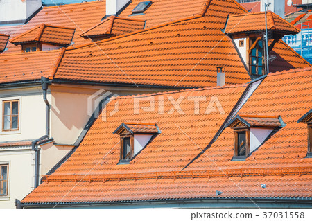 view of old red tiles roofs in Prague 37031558