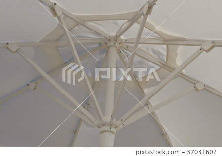 Beach umbrella against the blue clear sky Beach umbrella against the blue clear sky 37031602