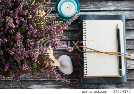 Notebook, heather flowers, candles Notebook, heather flowers, candles 37034573