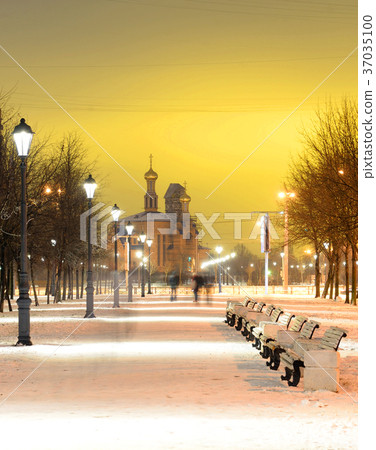 Alley at winter night. 37035100