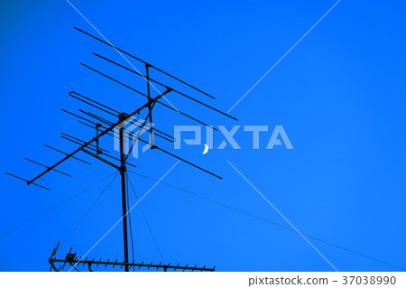 Sunset landscape with antenna in residential area 37038990