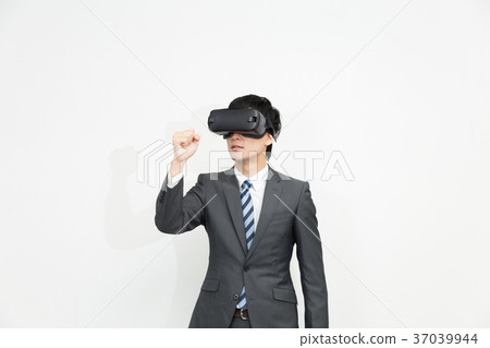 Businessman trying VR equipment Businessman trying VR equipment 37039944
