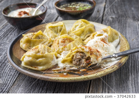 Traditional Turkish Manti with Joghurt and Vinegar 37042633