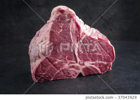 Raw dry aged Wagyu Porterhouse Steak Raw dry aged Wagyu Porterhouse Steak 37043929