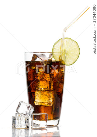 Glass of cola with ice cubes, lime and straw Glass of cola with ice cubes, lime and straw 37044090