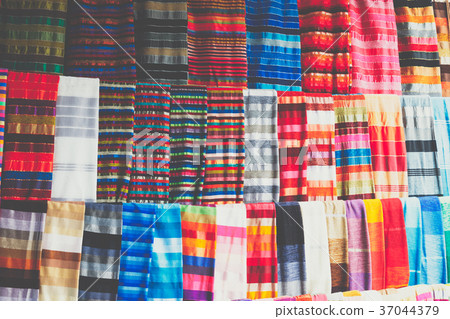 Selection of colorfu clothes on traditional market 37044379