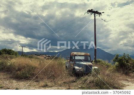 Old retro car on the mountain landscape background 37045092