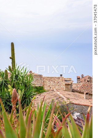 Daylight foggy view to Eze village with botanical Daylight foggy view to Eze village with botanical 37045478