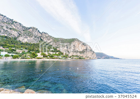 Daylight view to blue sea and green mountains Daylight view to blue sea and green mountains 37045524