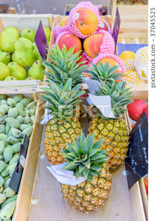 Fresh figs, pineapples, pears and peaches 37045525