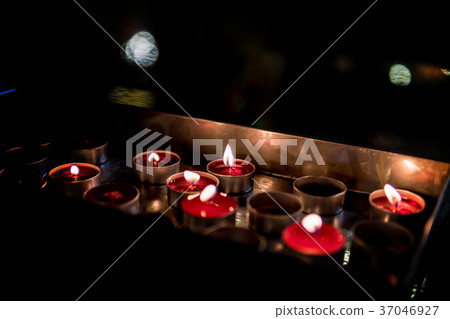 fire flame from  red candles for sacred worship  37046927