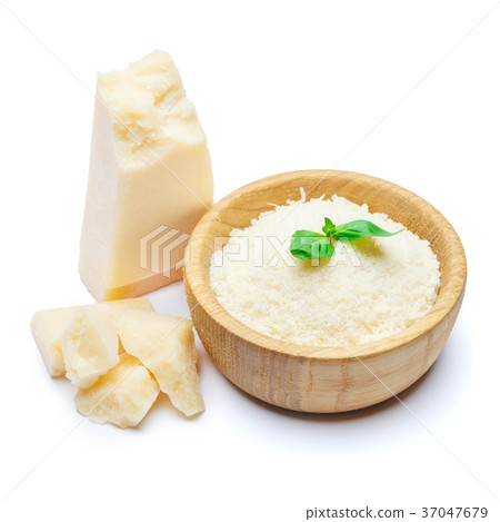 grated Parmesan cheese in wooden bowl on white 37047679