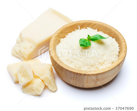 grated Parmesan cheese in wooden bowl on white grated Parmesan cheese in wooden bowl on white 37047690